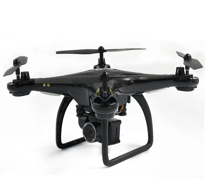 Black quadcopter drone with camera, landing gear, and four propellers on a white background