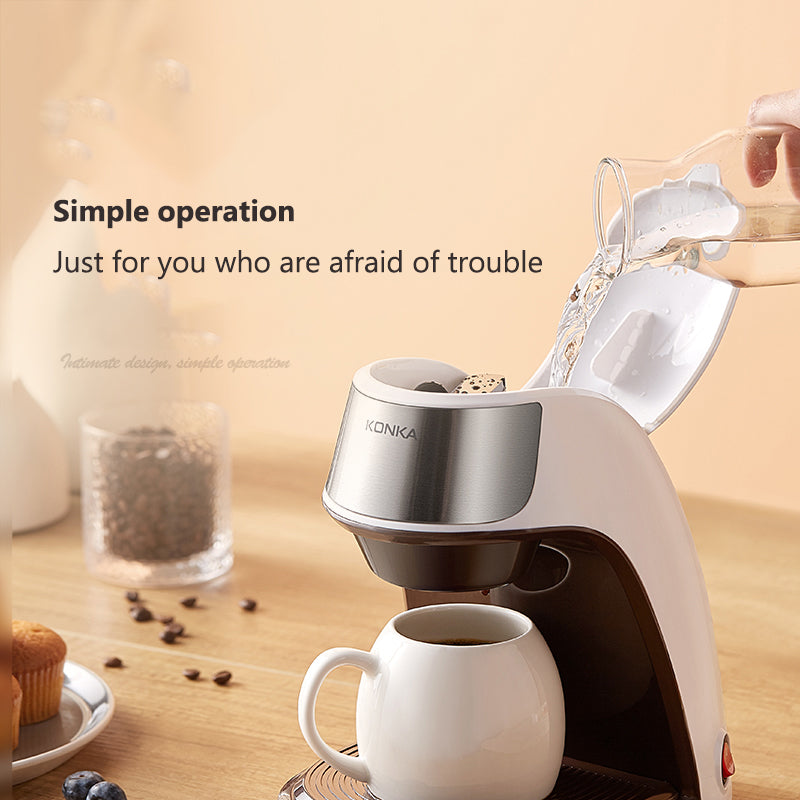 Portable Mini Coffee Maker in operation, pouring water into a ceramic cup with a modern design.