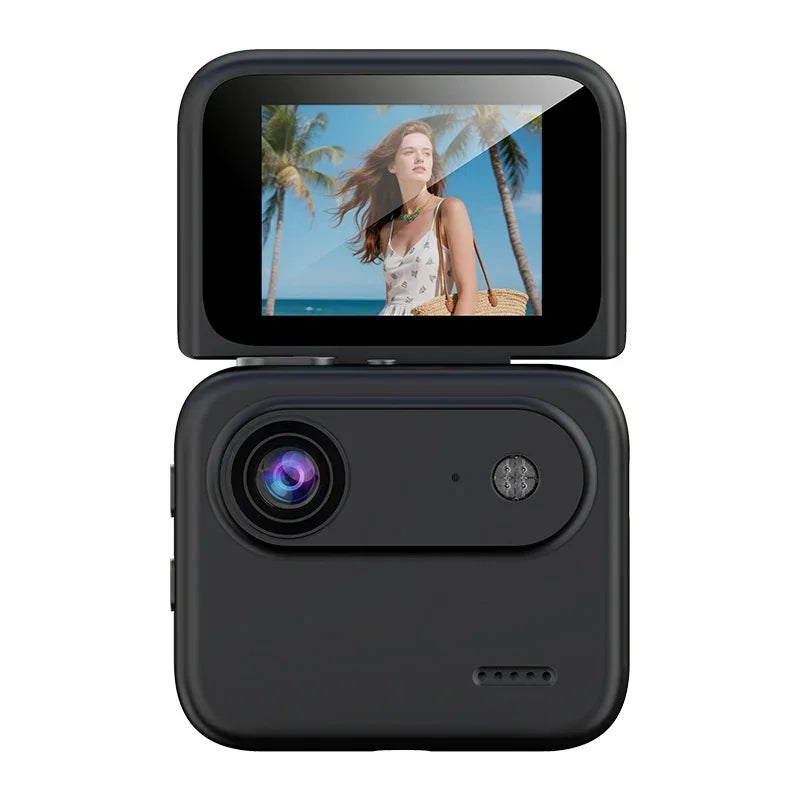 Black digital action camera with flip screen displaying woman on tropical beach
